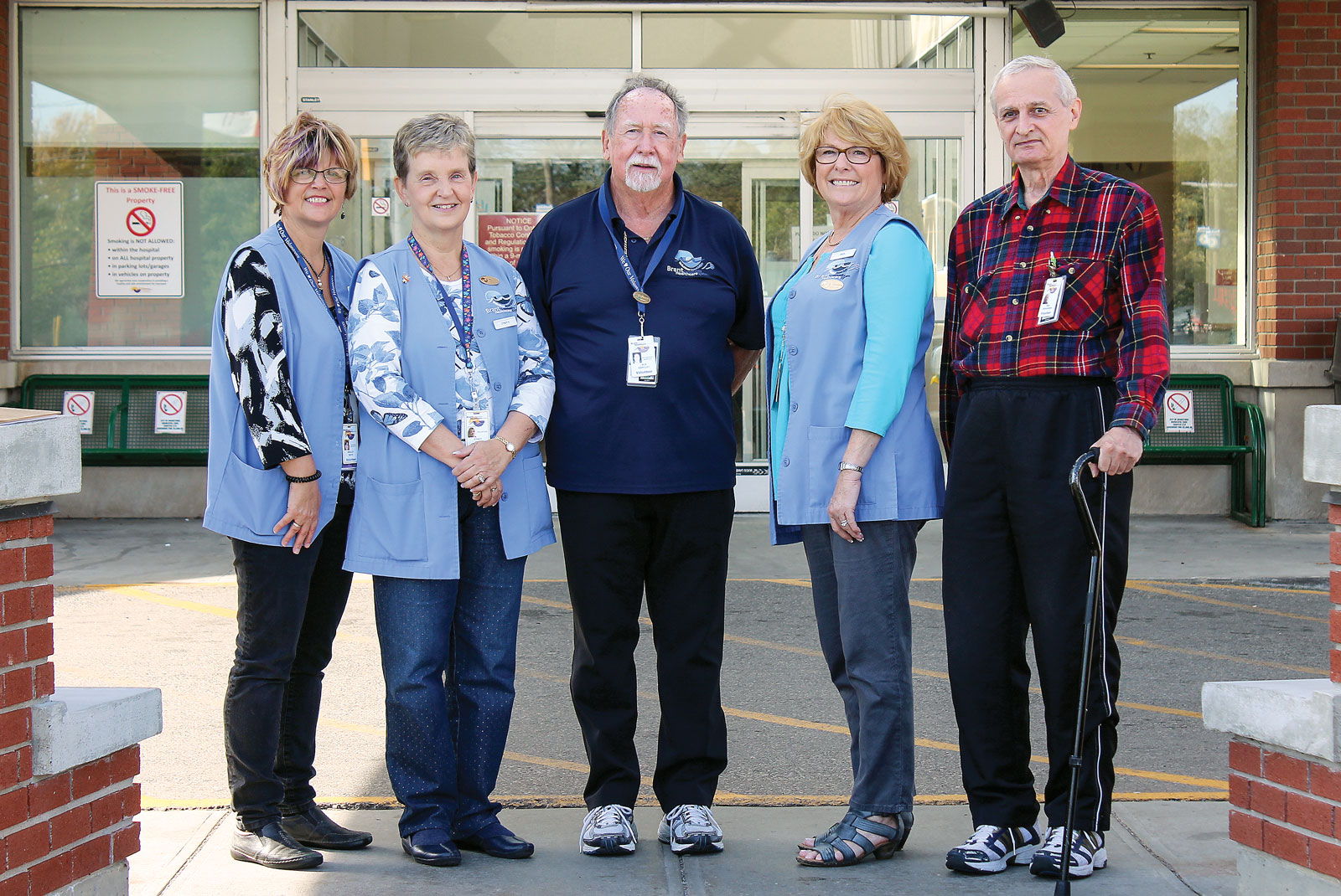 Group of volunteers outside hospital doors