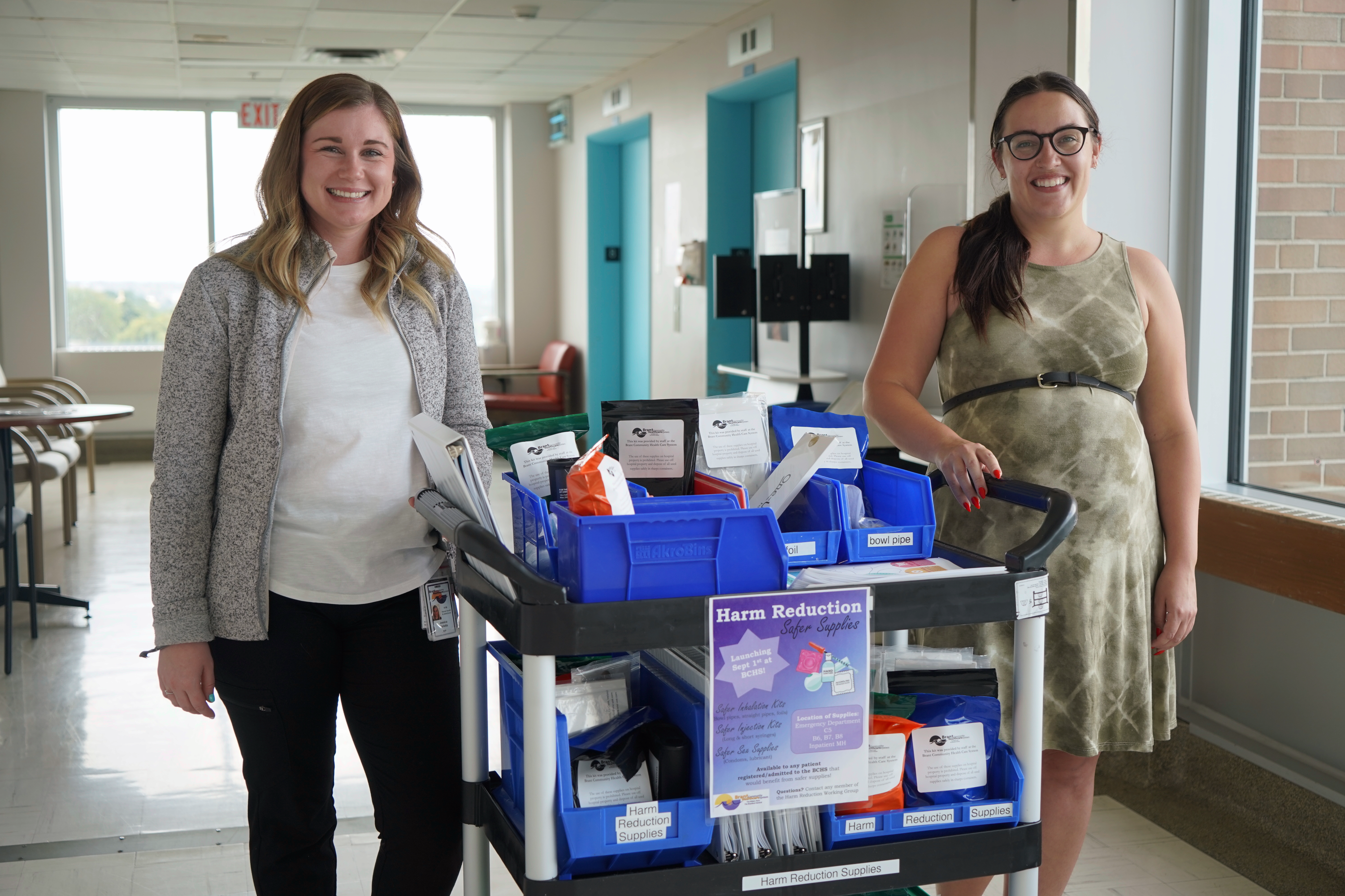 Jessica Mallette and Alana Willemsma with their harm reduction safer supplies cart