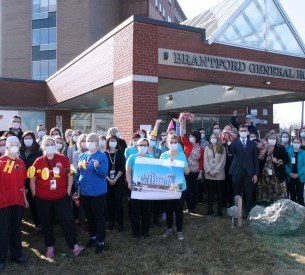 staff celebrate the announcement outside Brantford General Hospital