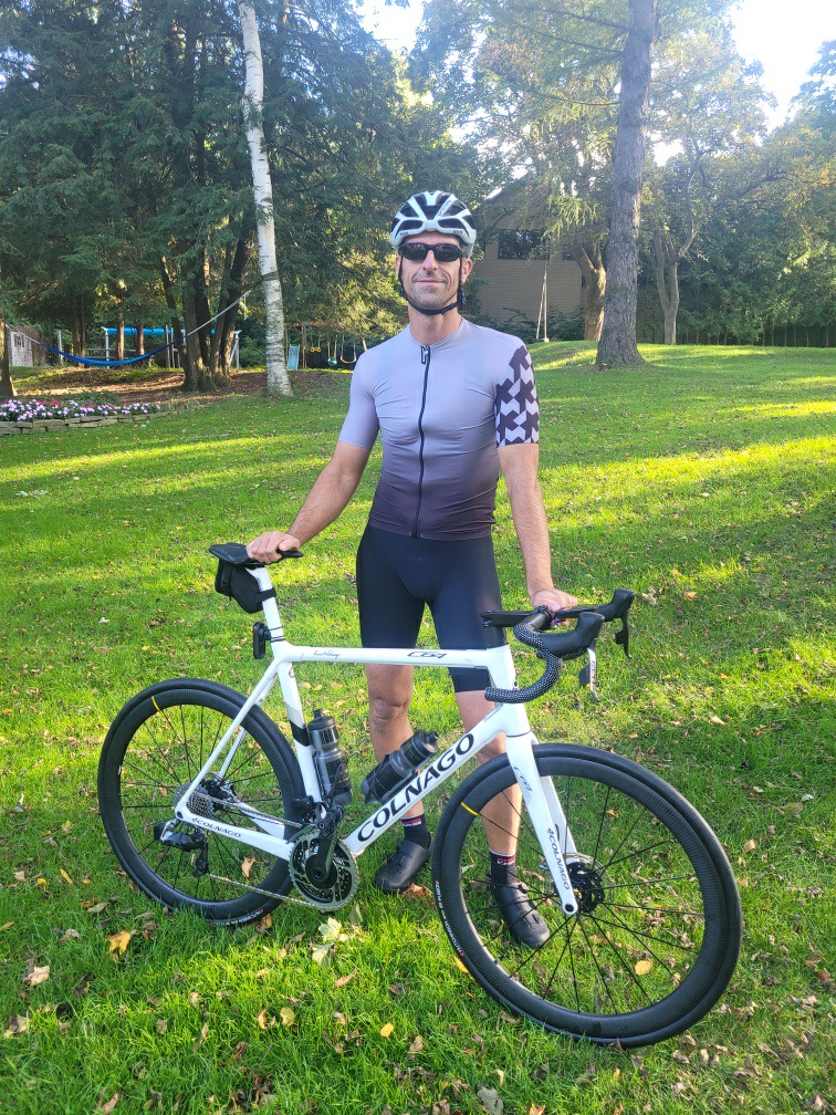 Dr. Szakacs poses with his bicycle