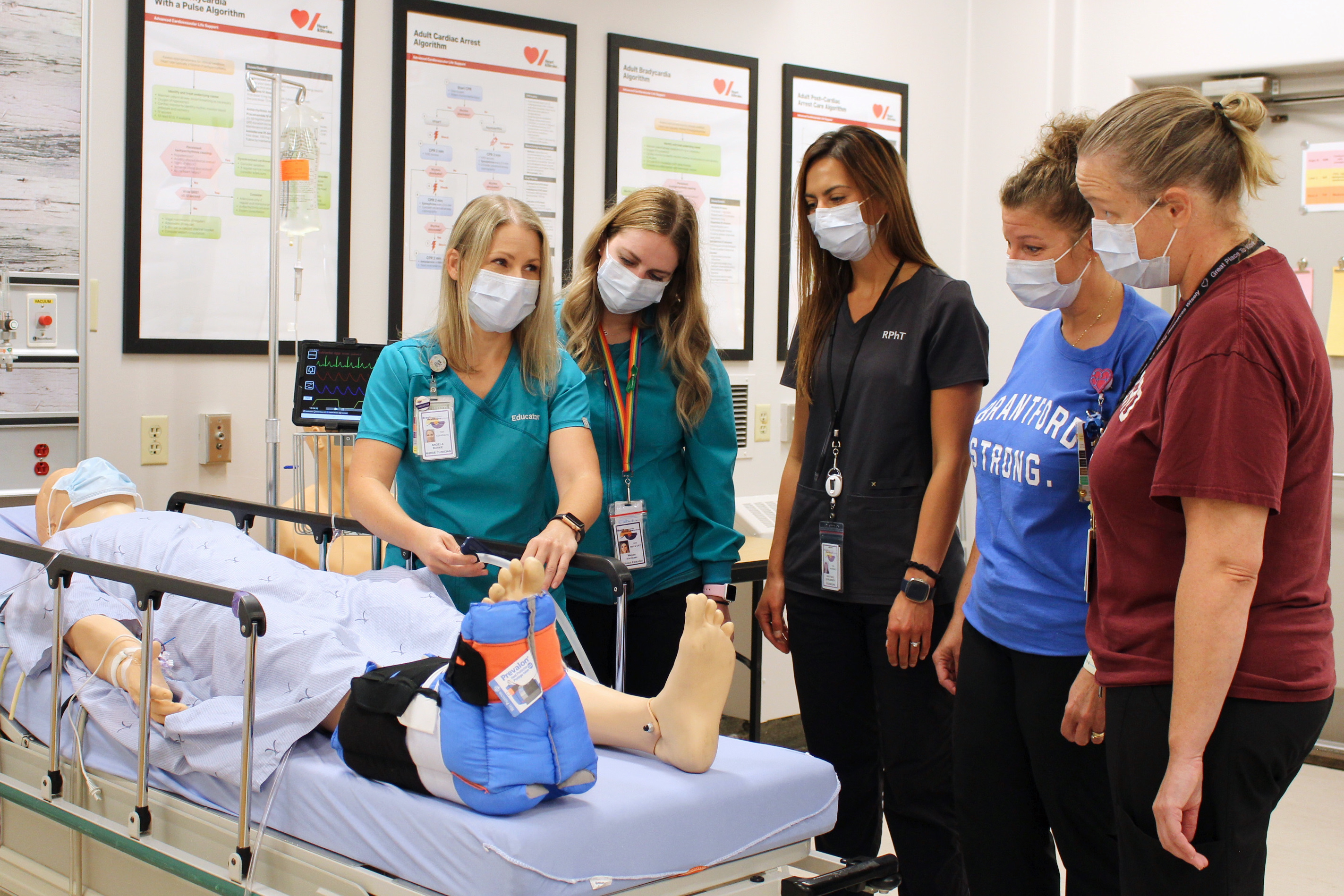 Clinical educator Angela Burke is surrounded by staff enrolled in the Brant Community Healthcare System Preceptor Program