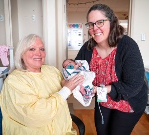 Matthew Mutamiri, clinical manager of inpatient mental health and addictions and spiritual care, stands with Carol Caswell, spiritual care practitioner, in the multifaith centre at Brantford General Hospital.