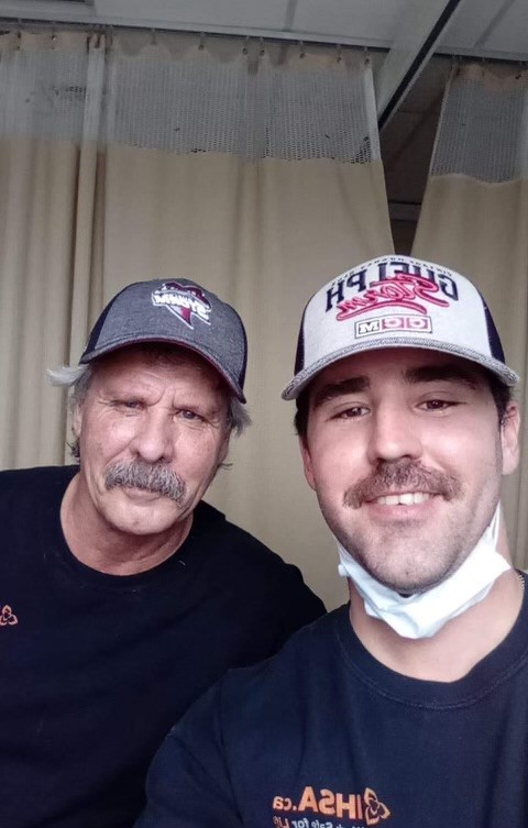 Pictured: Benjamin Andrews (left) with his son Chris Andrews (right).
