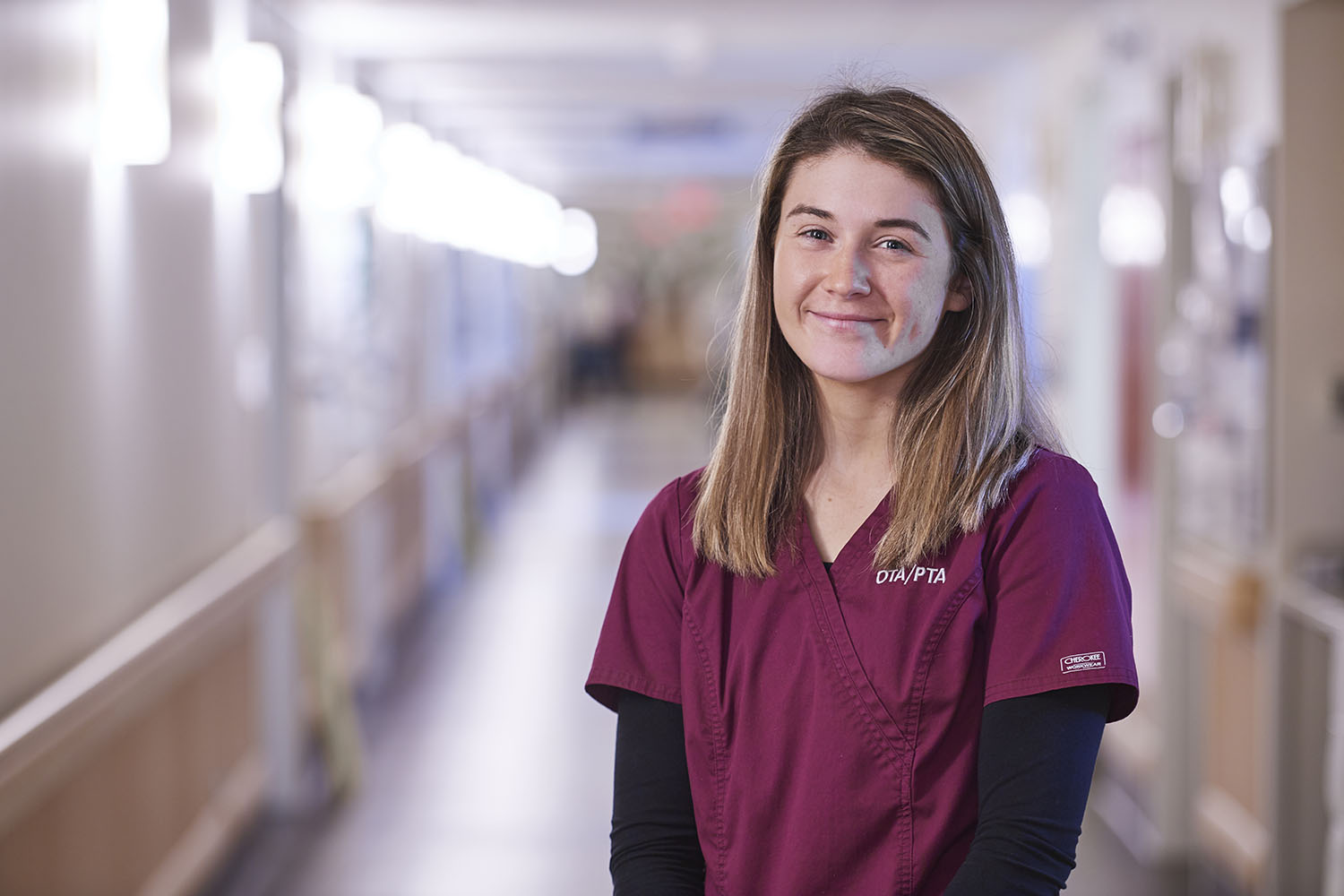 Staff member smiling